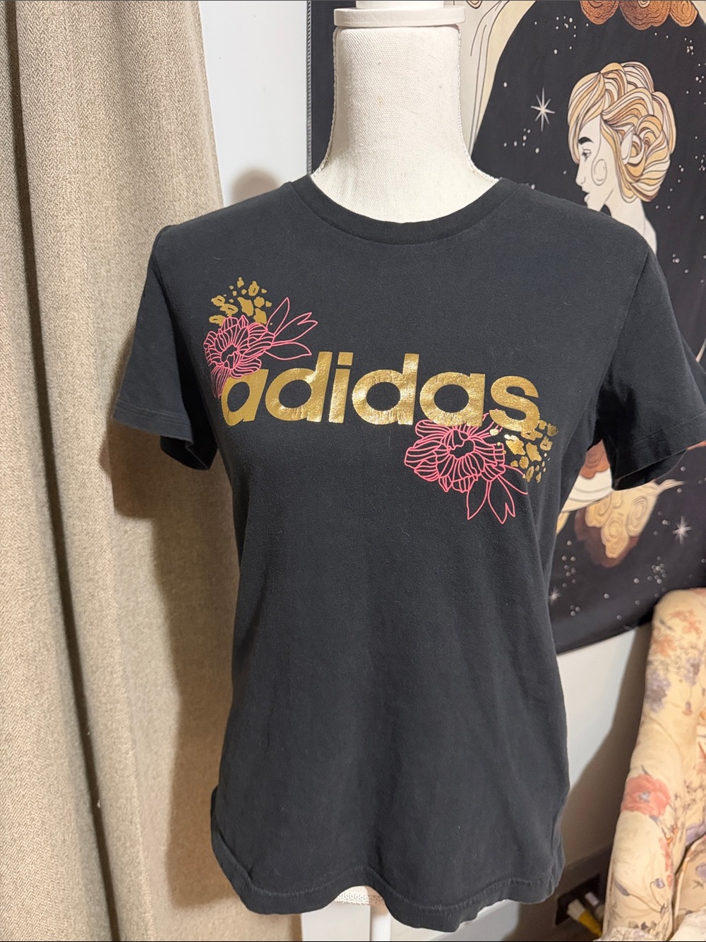 adidas Black Short-Sleeve Tee with Gold Logo and Pink Floral Accents